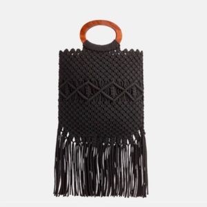 Danielle Nicole Black woven crossbody bag.